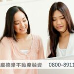 2 women looking at computer