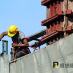 Construction workers building construction